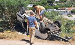 Virajı alamayan araç takla attı