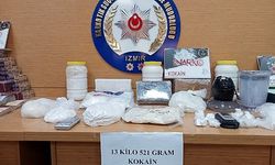 Evden 13,5 kilogram kokain ve binlerce hap çıktı