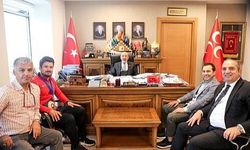 Dünya Şampiyonu Cengiz MHP'yi Ziyaret Etti