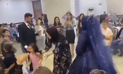 Gelinin eteğine basılınca, çocukların yüzene sprey sıktı!