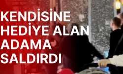 Kendisine hediye alan adama tekme-yumruk saldırdı