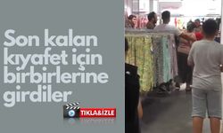 Son kalan kıyafet için birbirlerine girdiler