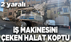 İş makinesini çeken halat koptu, 2 kişi yaralandı