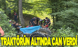 Devrilen traktörün altında kaldı