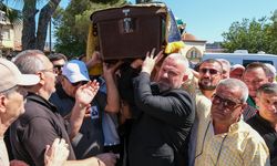 Eski başkan toprağa verildi